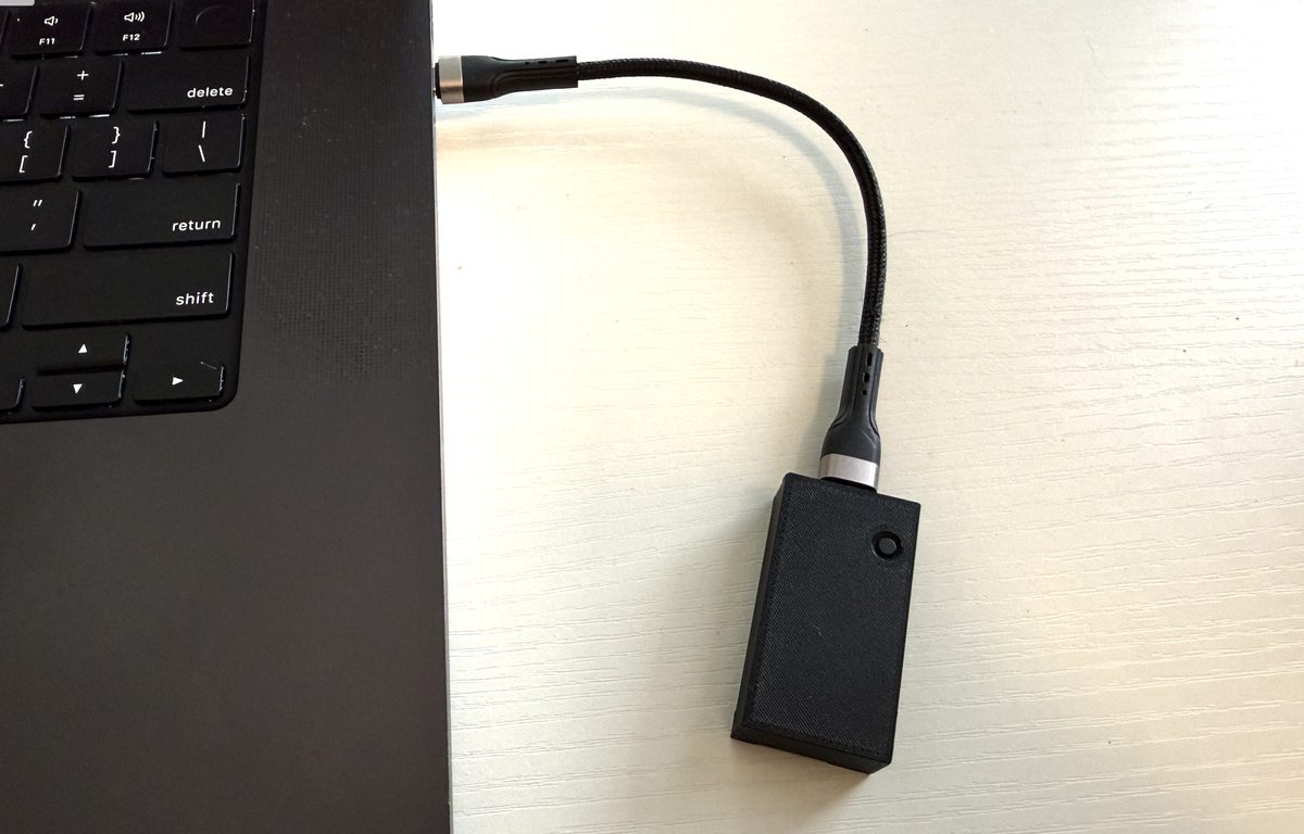 DeskAwake plugged into a laptop USB port